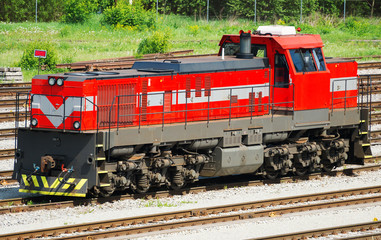 Railroad freight train on the station.