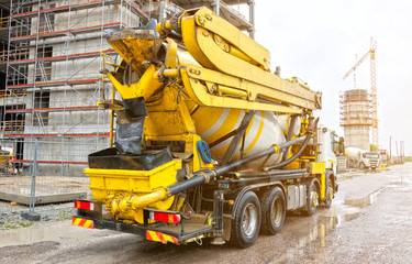 Concrete mixer truck on construction site. HDR Photo.