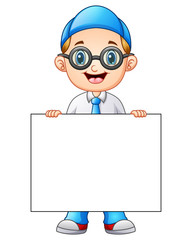 Cute boy in a school uniform holding blank sign