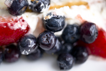 Fruit cake with strawberries and blueberries
