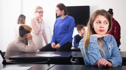 female student feeling uncomfortable at break between classes