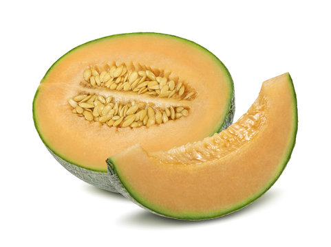 Cantaloupe melon half and pieces isolated on white