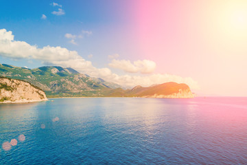 Mountains and the sea in the sunlight