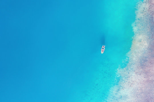 Top view of a white yacht in the sea