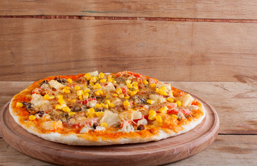 Fresh pizza with cheese