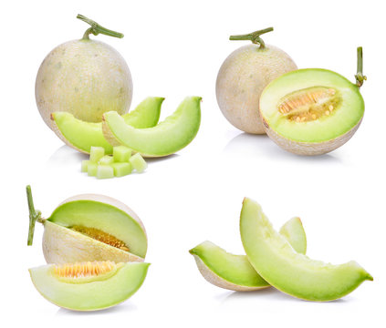 set of green cantaloupe melon with slice and cubes isolated on white background
