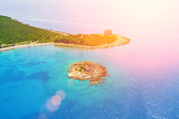 Top view of the island with a fortress in the sunlight