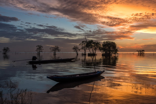 Beautiful sunrise and sky in the morning at Pakpra village, Phatthalung, Thailand.