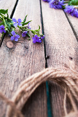 Flowers on a wooden background bouquet creation.