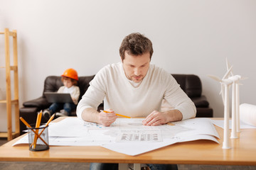 Very attentive engineer figuring on result