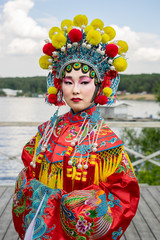 portrait of beautiful chinese girl in traditional chinese dress