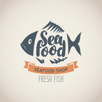 Vector emblem or banner for seafood shop with decorative fish, inscription seafood and words fresh fish on the beige background in retro style.