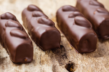 Luxury handmade chocolate  bonbons on wooden background
