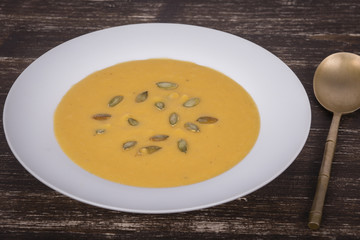 Apple pumpkin cream soup in a dish