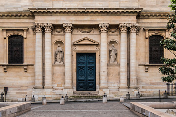 Obraz premium Fragment of Sorbonne edifice. Name is derived from College de Sorbonne (1257) by Robert de Sorbon as one of first colleges of medieval University in Paris.