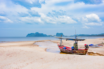 Fototapeta na wymiar fishing boat on the beach seascape in Thailand