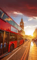 Poster Double decker bus against Big Ben with colorful sunset in London, England, UK © Tomas Marek