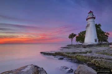 Rolgordijnen Marblehead Lighthouse on Lake Erie, USA at sunrise © sara_winter