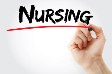 Hand writing Nursing with marker, concept background