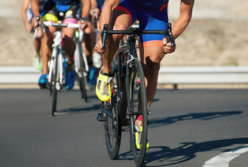 Cycling competition,cyclist athletes riding a race at high speed