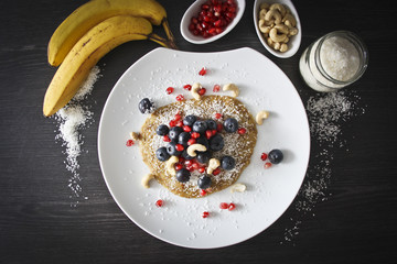 Banana-Pancake with Cashews, Blueberries and pomegranate