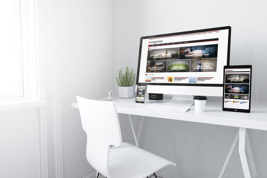  devices on white minimal workspace responsive emagazine website