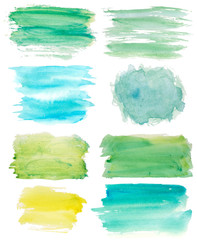 set of watercolor brushes on white. green, blue, yellow colors