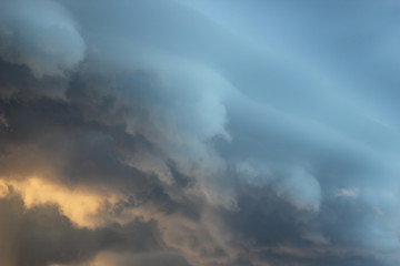 Naklejka na ściany i meble storm clouds at sunset