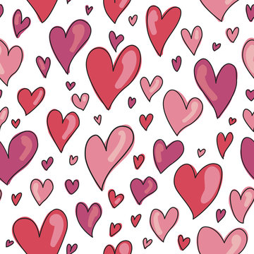 Seamless hand drawn hearts pattern in shades of red and pink. Perfect for background, fabrics, clothing, websites.