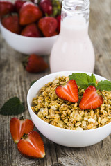 Granola and smoothies with strawberry