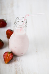Smoothies and ripe strawberry