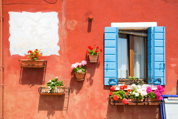 Fototapeta na wymiar Colourful wall of picturesque house