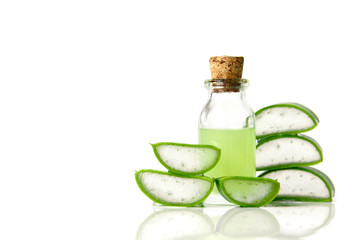 Cut Aloe Vera leaves and Aloe Vera products.