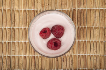 glass of fresh berries and yogurt