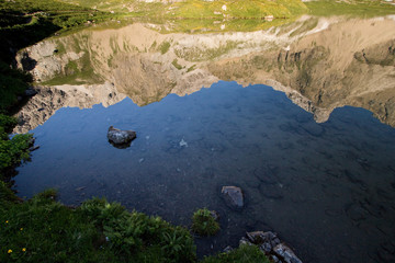 Reflections in Alpine lake