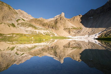 Reflections in Alpine lake