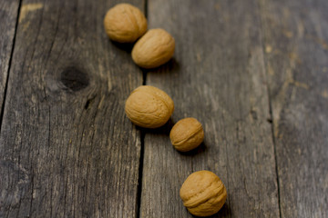 walnut on wooden background