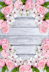 Magnolia flowers with roses, hortensia and place for your text