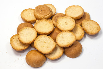 French toast, biscuits, dried bread on white background