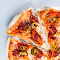 Spicy Italian sliced pizza with pepperoni and cheese