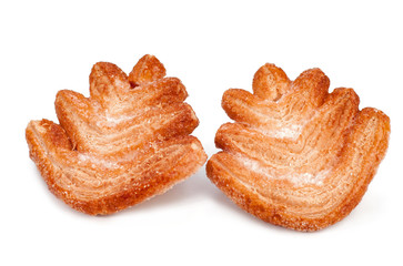 sweet puff pastry in the form of a Christmas tree. Bakery products isolated on white