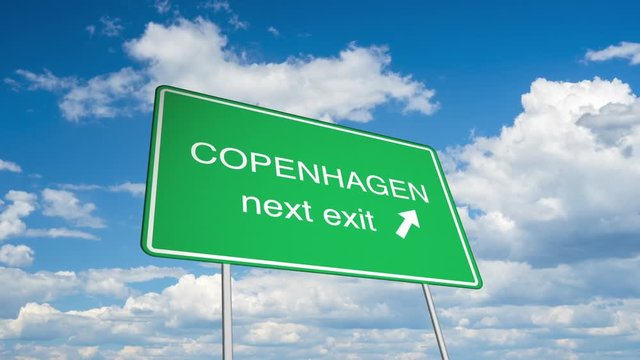 Animated road sign (Copenhagen), with a time lapsed sky as backdrop. 