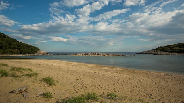 timelapse of a wooden shack on beautiful limoni beach in mljet island, croatia with stunning crystal clear water of the adriatic sea.