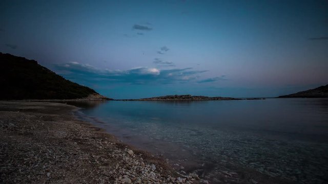 timelapse of a wooden shack on beautiful limoni beach in mljet island, croatia with stunning crystal clear water of the adriatic sea.