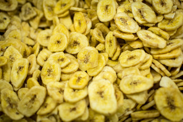 Banana Chips Sliced Dried Banana Background. Healthy Eating.
