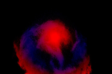 color powder explosion on black background.