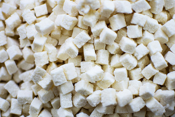 Fototapeta na wymiar Pile of Dried and Candied Coconut Close Up Background. Healthy Eating.