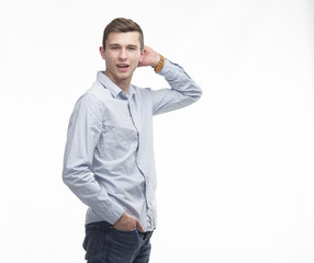 Young happy man showing presentation, pointing on placard over g