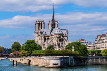 Fototapeta na wymiar View of Cathedral Notre Dame de Paris - a most famous Gothic, Roman Catholic cathedral (1163 - 1345) on the eastern half of the Cite Island.