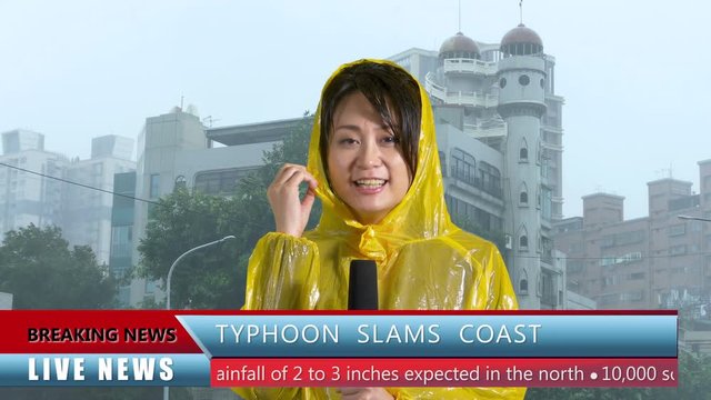 Asian female TV weather reporter reporting on typhoon